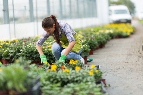 Team member preparing tools before garden maintenance